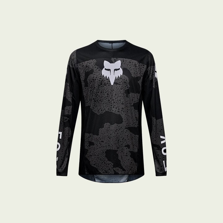 black jersey on green background