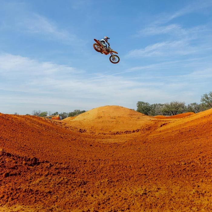 Motocross rider jumping.