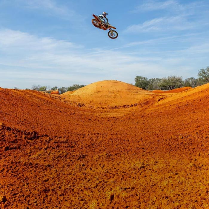 Motocross rider jumping.